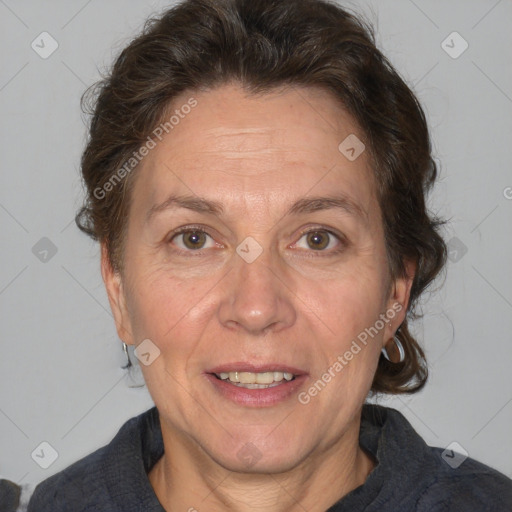 Joyful white adult female with short  brown hair and brown eyes