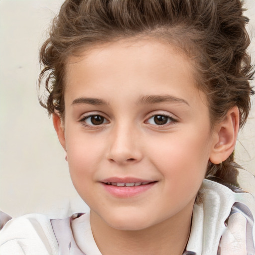 Joyful white child female with short  brown hair and brown eyes