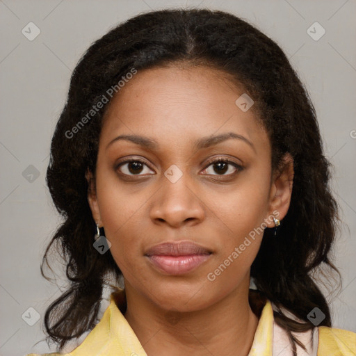 Joyful black young-adult female with medium  brown hair and brown eyes