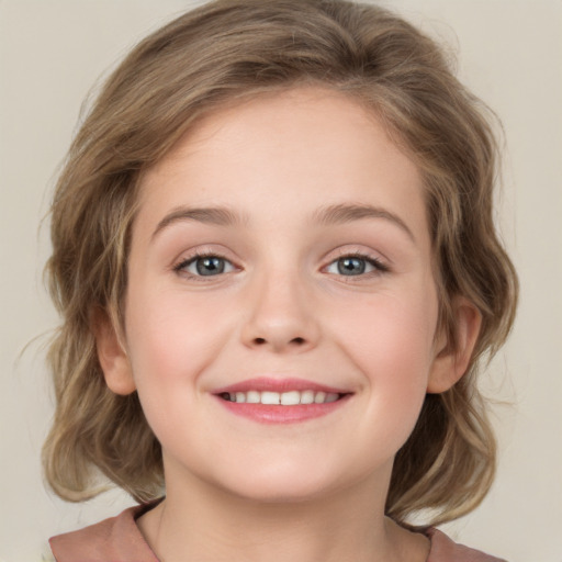 Joyful white child female with medium  brown hair and grey eyes