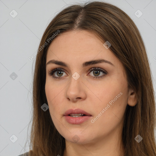 Neutral white young-adult female with long  brown hair and brown eyes