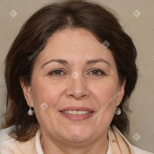 Joyful white adult female with medium  brown hair and brown eyes