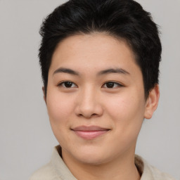 Joyful asian young-adult female with short  brown hair and brown eyes