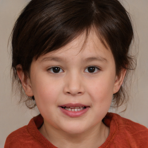 Joyful white child female with medium  brown hair and brown eyes