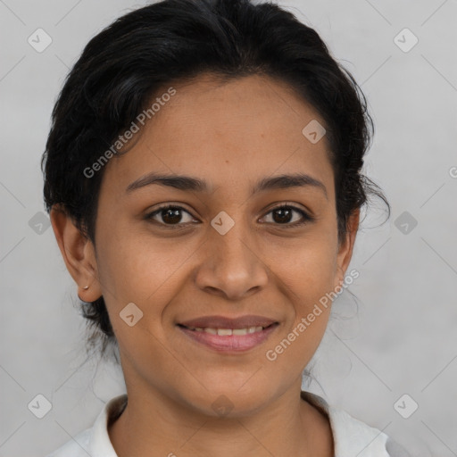 Joyful latino young-adult female with medium  brown hair and brown eyes