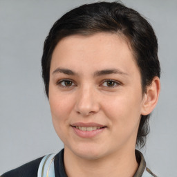 Joyful white young-adult female with medium  brown hair and brown eyes