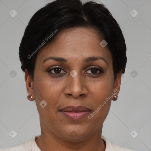 Joyful black adult female with short  brown hair and brown eyes