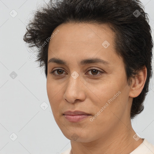 Joyful white adult female with short  brown hair and brown eyes