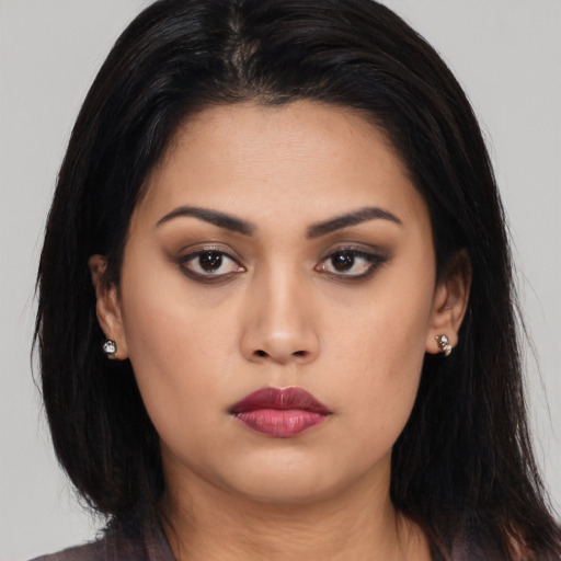 Neutral asian young-adult female with long  brown hair and brown eyes