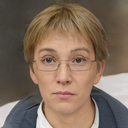 Neutral white adult female with short  brown hair and brown eyes