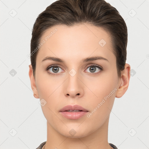 Neutral white young-adult female with short  brown hair and brown eyes