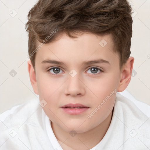 Joyful white child male with short  brown hair and brown eyes