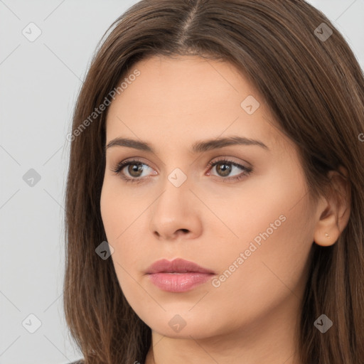 Neutral white young-adult female with long  brown hair and brown eyes