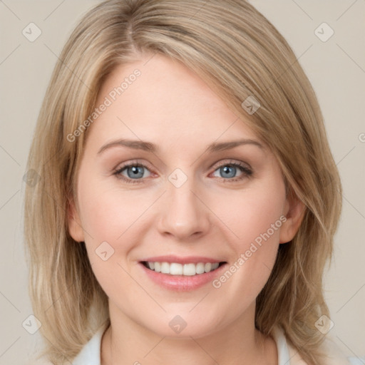 Joyful white young-adult female with medium  brown hair and blue eyes