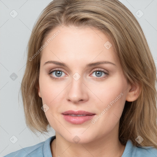 Joyful white young-adult female with medium  brown hair and blue eyes