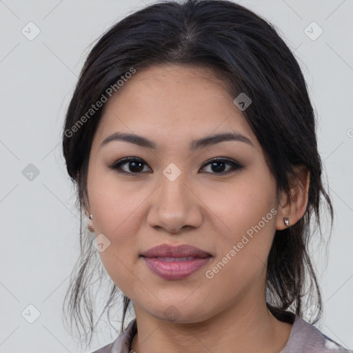 Joyful latino young-adult female with medium  black hair and brown eyes