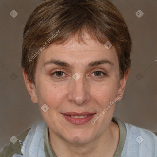 Joyful white adult female with short  brown hair and grey eyes