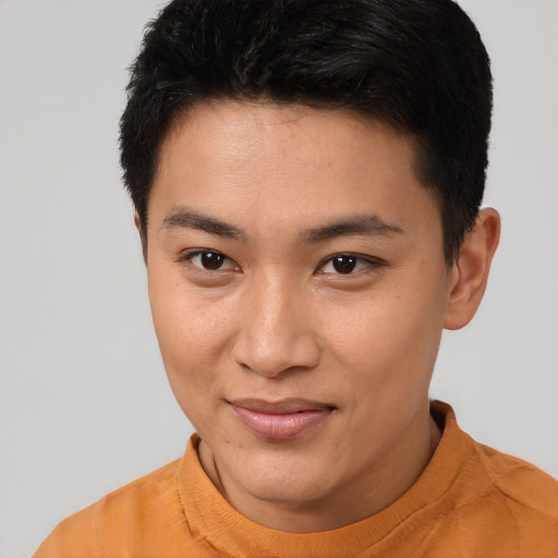 Joyful white young-adult female with short  black hair and brown eyes