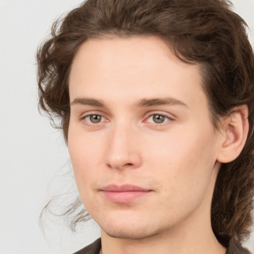 Neutral white young-adult male with medium  brown hair and brown eyes