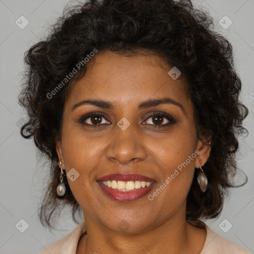 Joyful black young-adult female with medium  brown hair and brown eyes