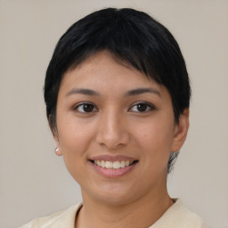 Joyful asian young-adult female with short  black hair and brown eyes