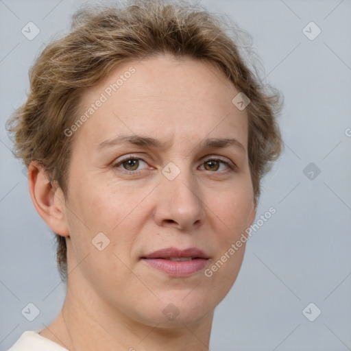 Joyful white adult female with short  brown hair and grey eyes