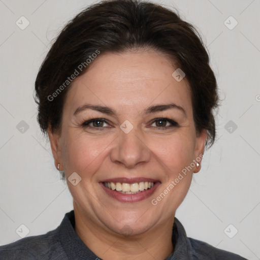 Joyful white adult female with short  brown hair and brown eyes