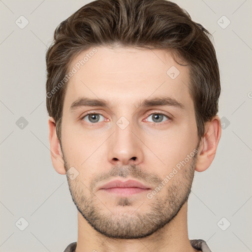 Neutral white young-adult male with short  brown hair and grey eyes