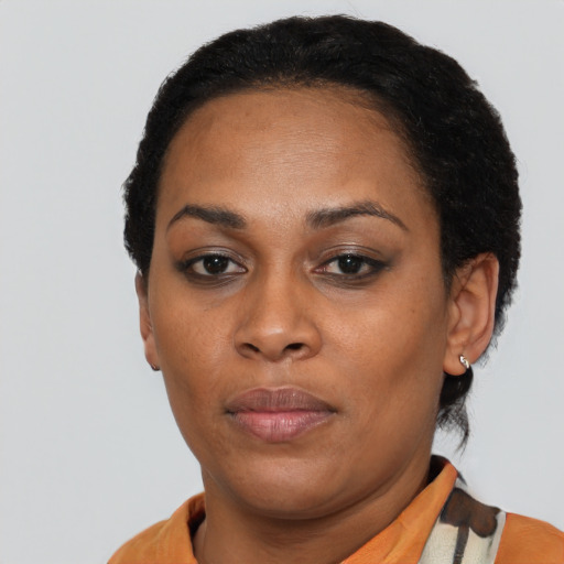 Neutral latino young-adult female with short  black hair and brown eyes