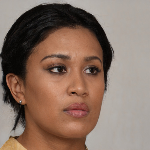 Neutral asian young-adult female with medium  black hair and brown eyes