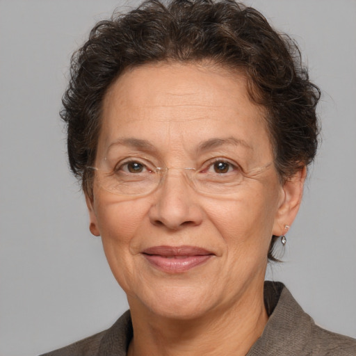 Joyful white middle-aged female with medium  brown hair and brown eyes