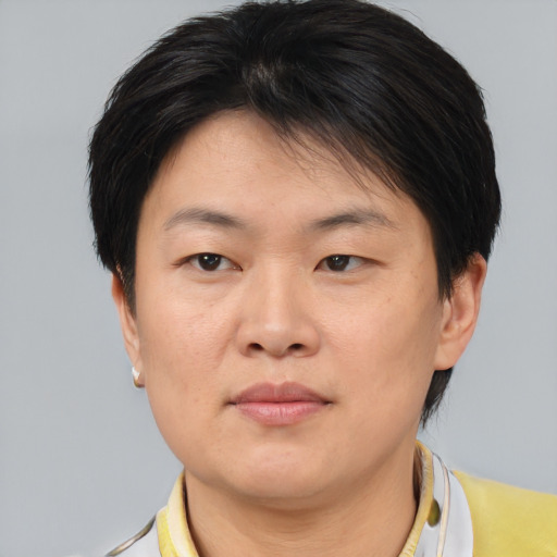 Neutral asian young-adult female with short  brown hair and brown eyes