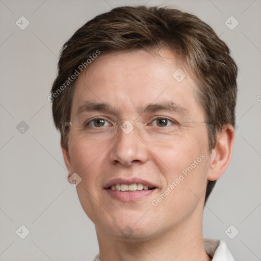 Joyful white adult male with short  brown hair and grey eyes