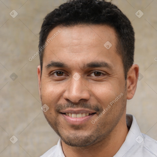 Joyful white young-adult male with short  black hair and brown eyes