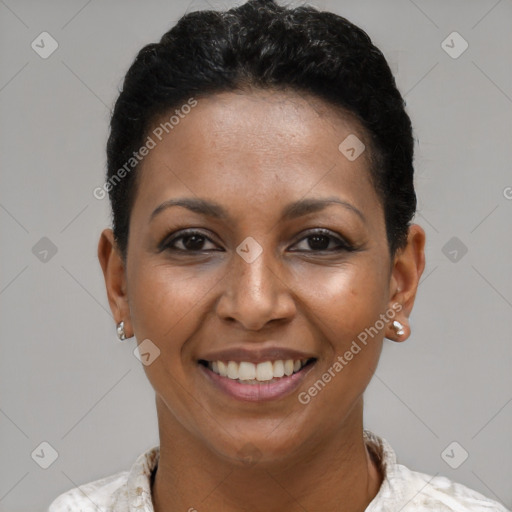 Joyful black young-adult female with short  brown hair and brown eyes