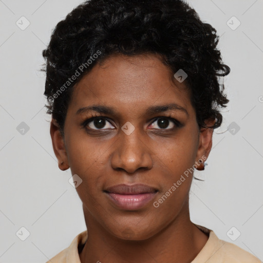 Joyful black young-adult female with short  black hair and brown eyes