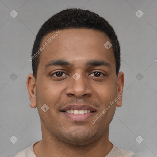 Joyful latino young-adult male with short  brown hair and brown eyes