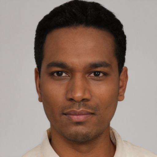 Neutral latino young-adult male with short  black hair and brown eyes