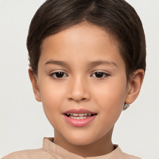 Joyful white child female with short  brown hair and brown eyes