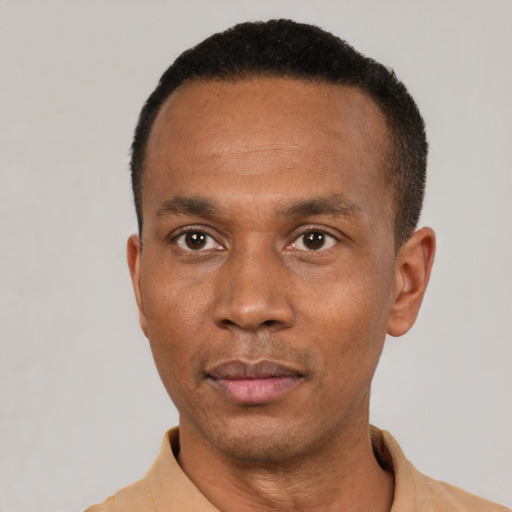 Neutral latino adult male with short  black hair and brown eyes