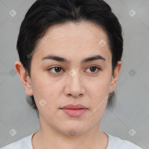 Joyful asian young-adult female with medium  brown hair and brown eyes