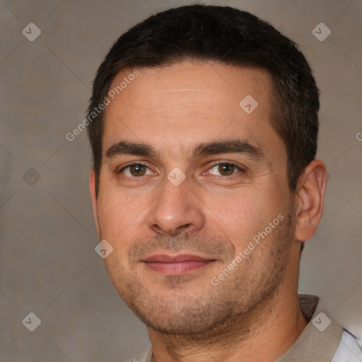 Joyful white adult male with short  brown hair and brown eyes