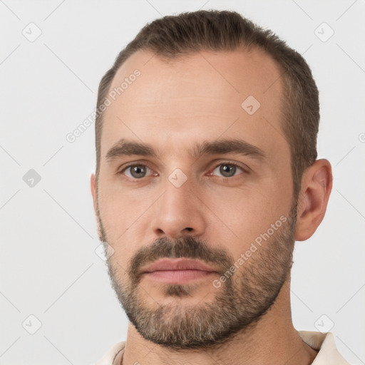 Neutral white young-adult male with short  brown hair and brown eyes