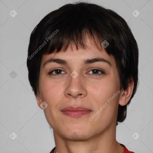 Joyful white adult female with short  brown hair and brown eyes