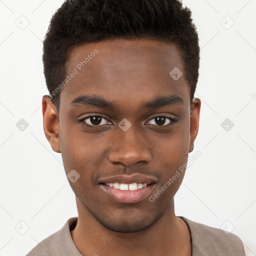 Joyful black young-adult male with short  brown hair and brown eyes