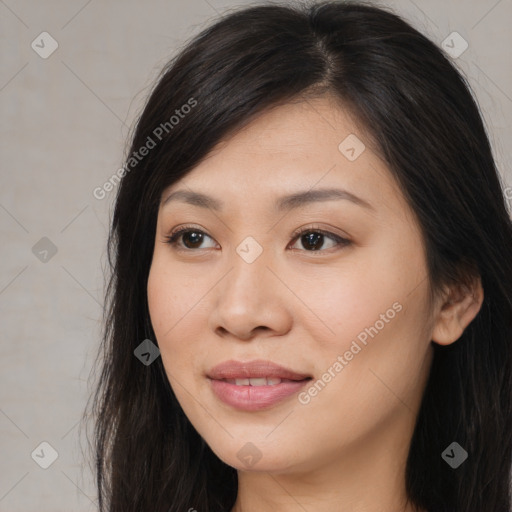 Joyful asian young-adult female with long  brown hair and brown eyes