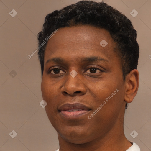Joyful black young-adult male with short  black hair and brown eyes