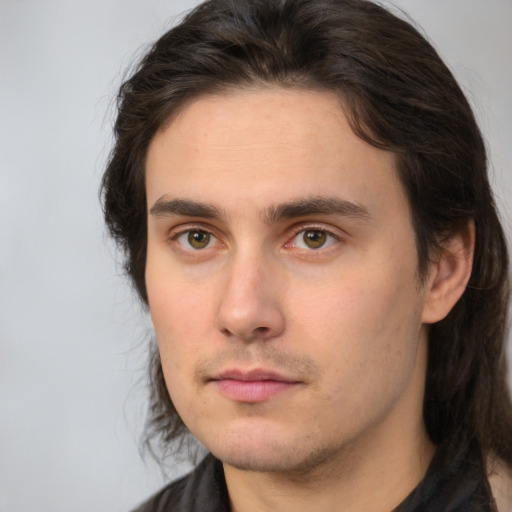 Neutral white young-adult male with medium  brown hair and brown eyes