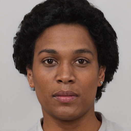 Neutral black young-adult female with short  black hair and brown eyes