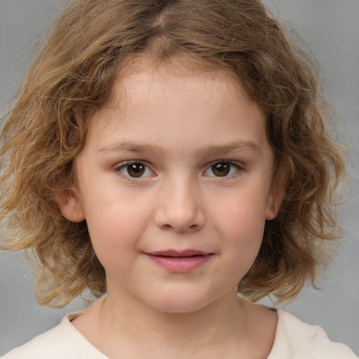 Joyful white child female with medium  brown hair and brown eyes